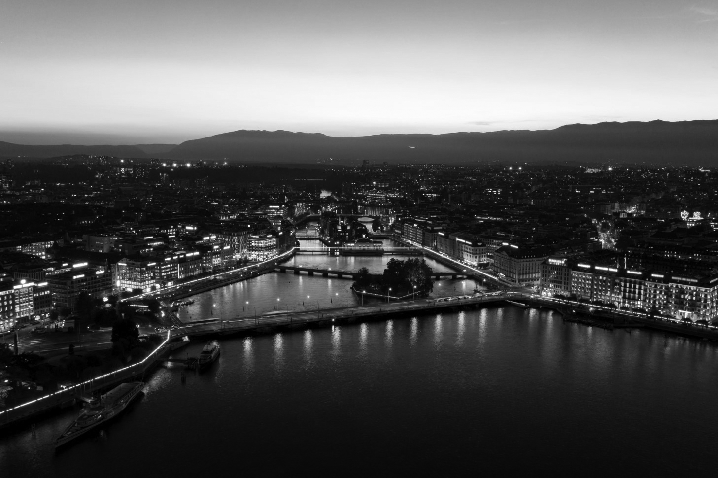 Geneva and its bridges at night