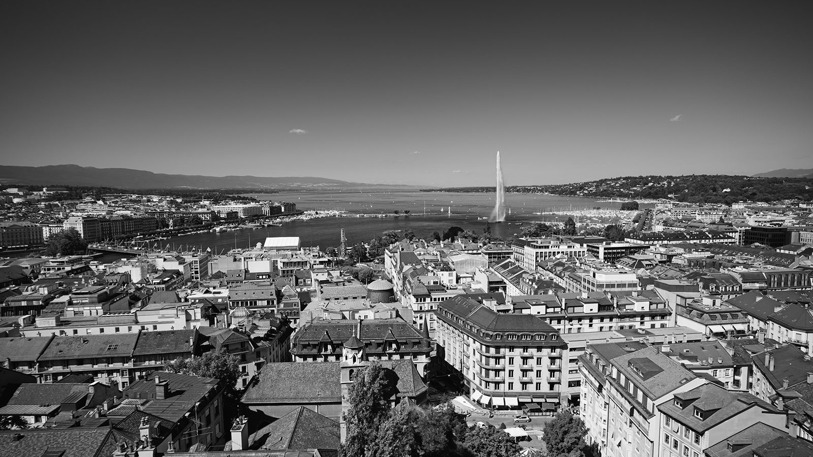 Geneva from above, across the old town to the lake